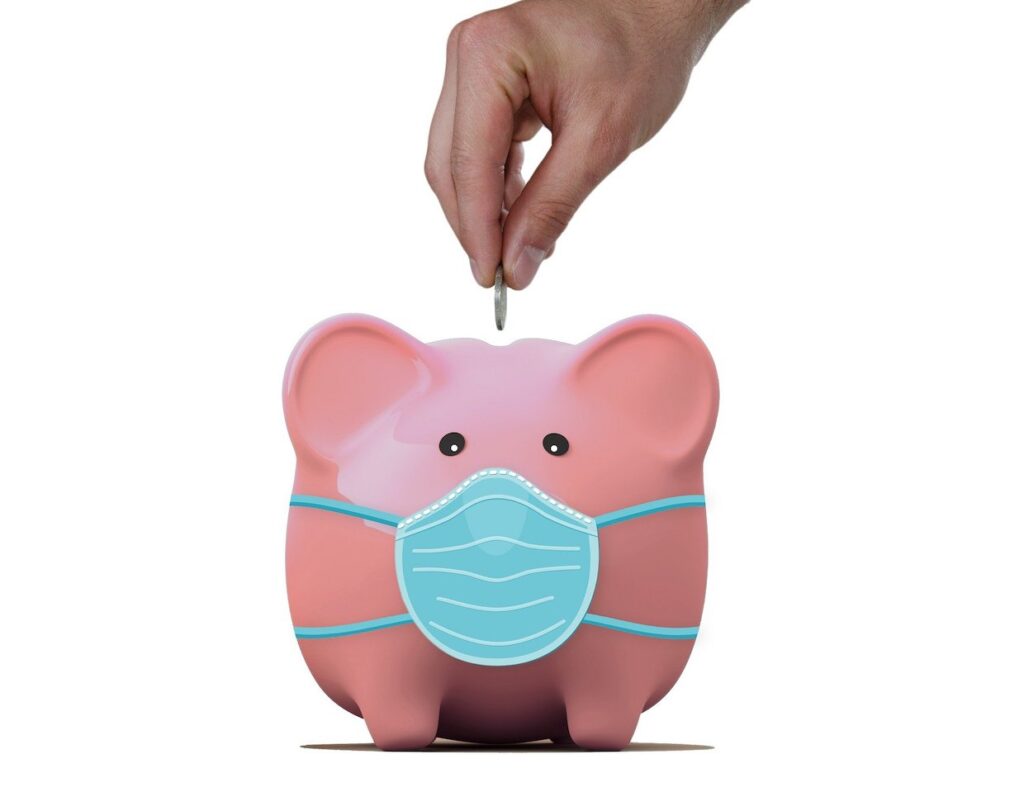 Putting money in a piggy bank
