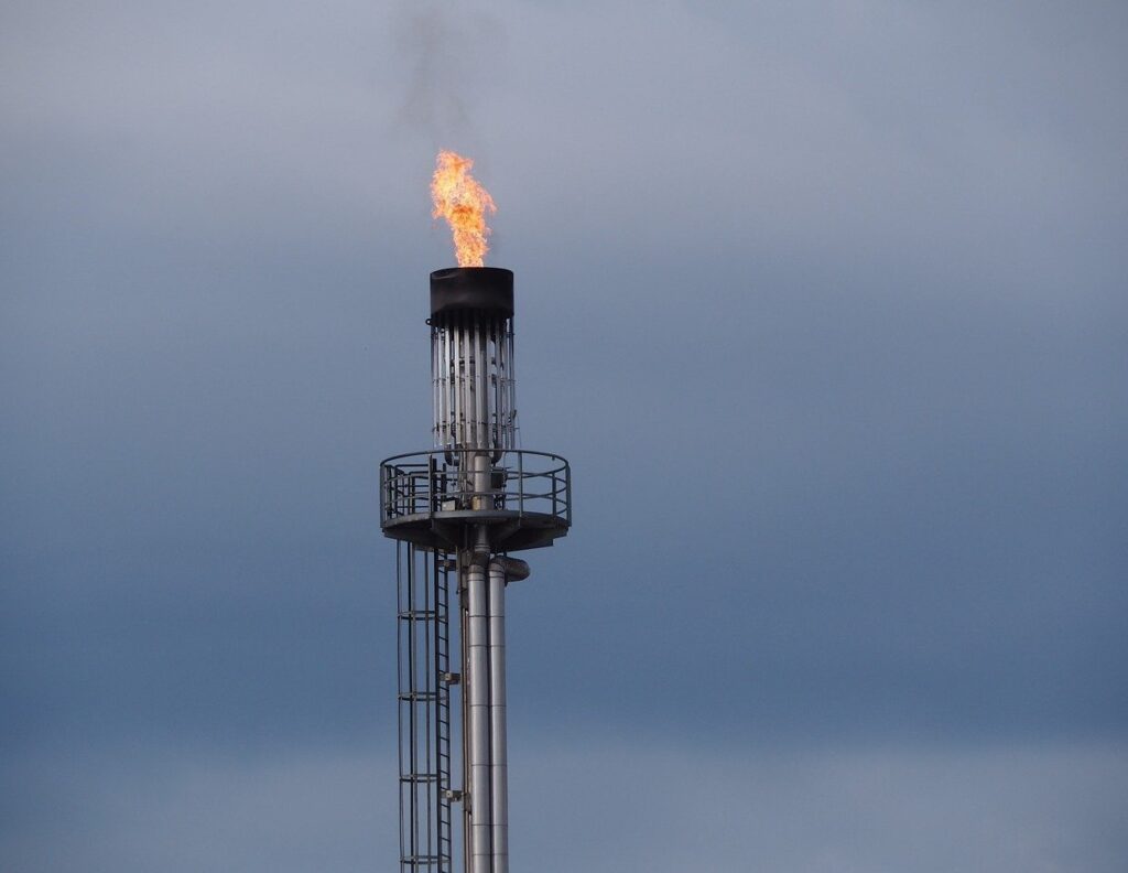 Flame burning out of tower